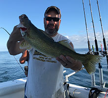 man holding a big walleye
