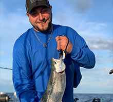 man holding steelhead out