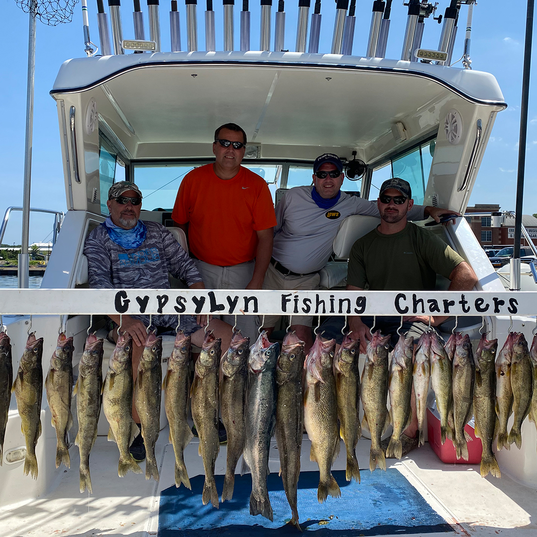 family with walleye catch