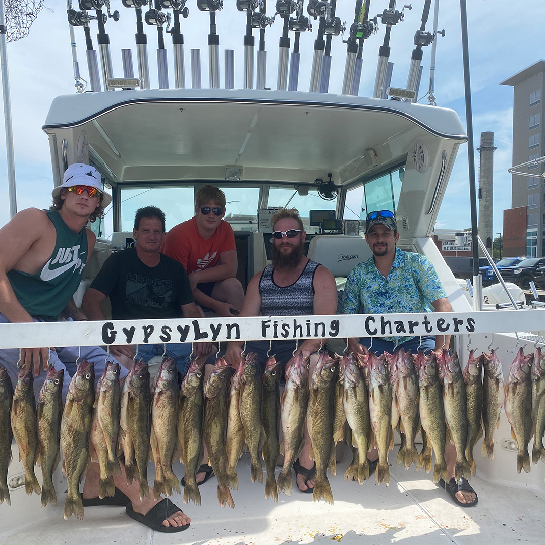 woman holding a big lake trout