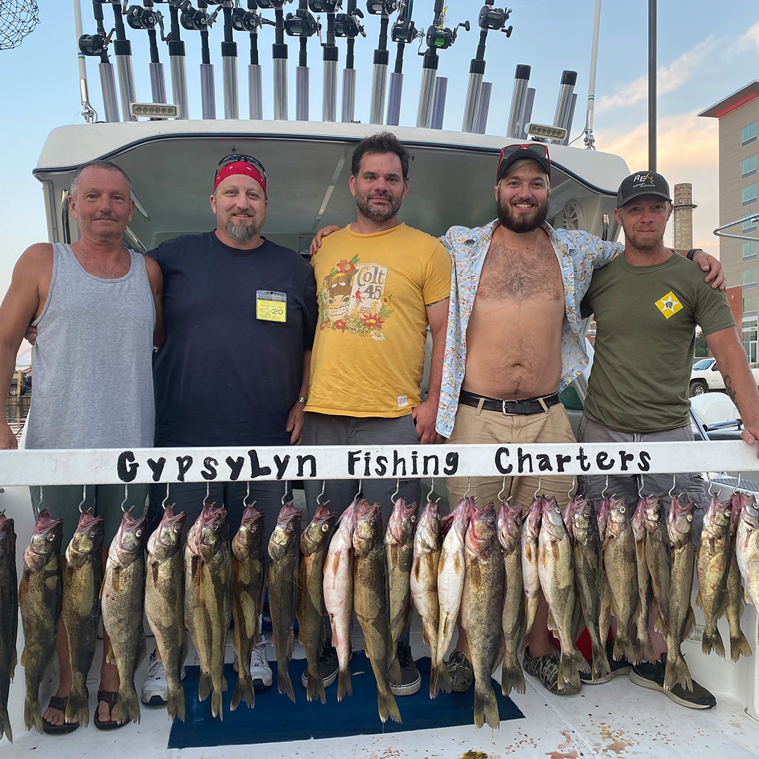 family with walleye catch