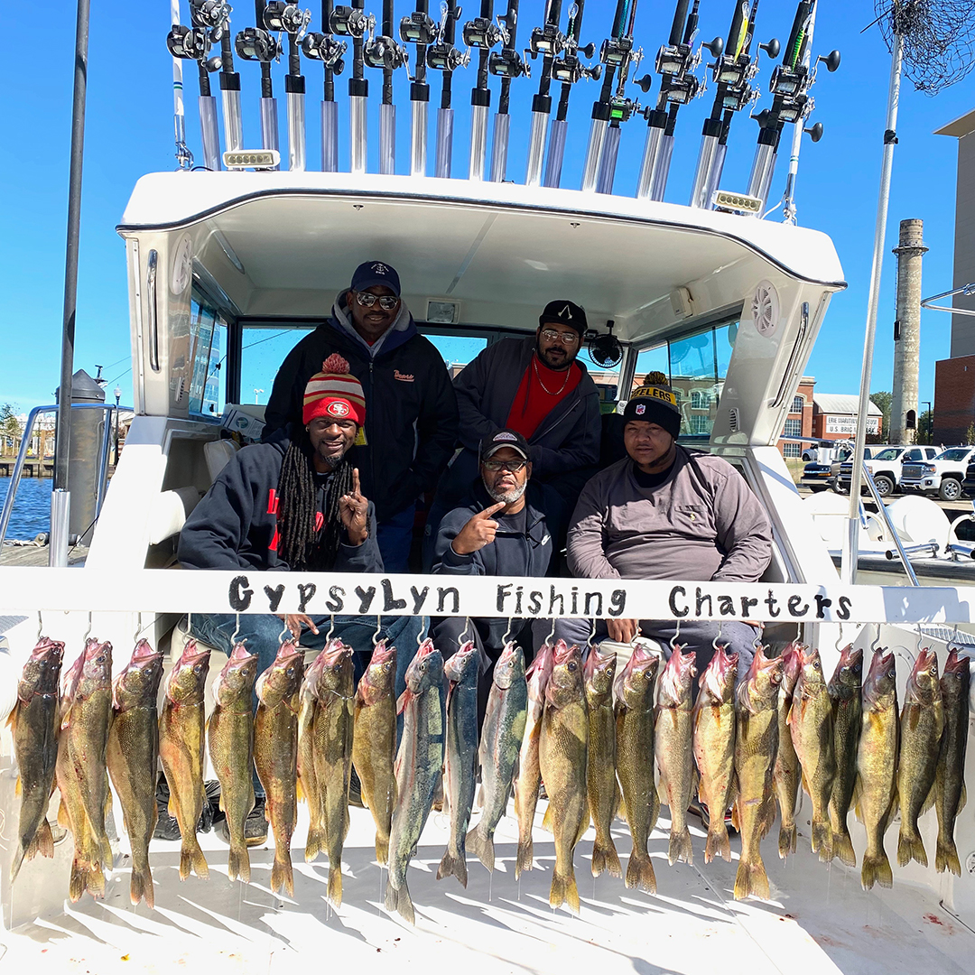 family with walleye catch