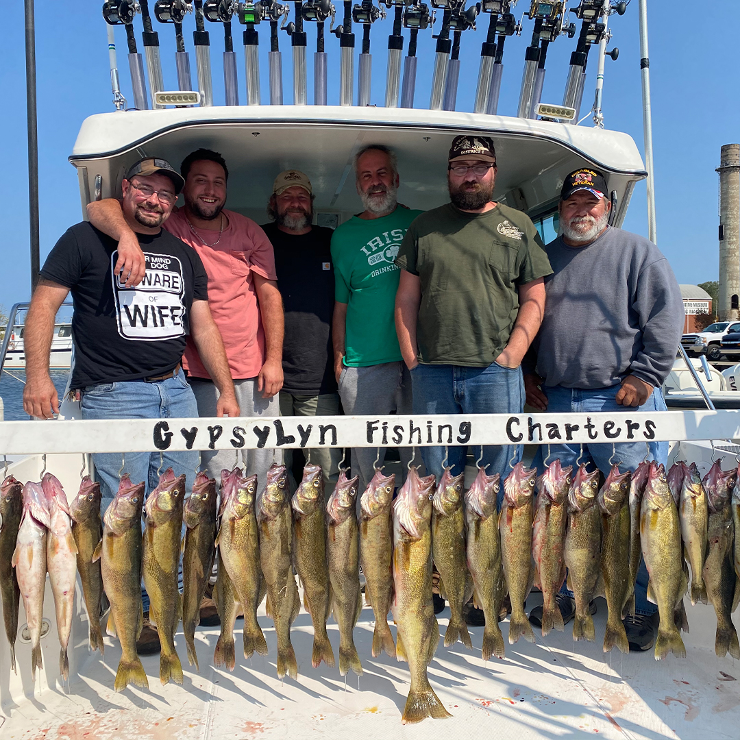 woman holding a big lake trout