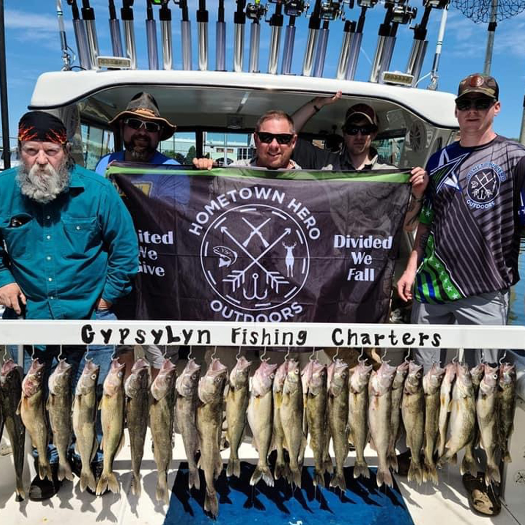 woman holding a big lake trout