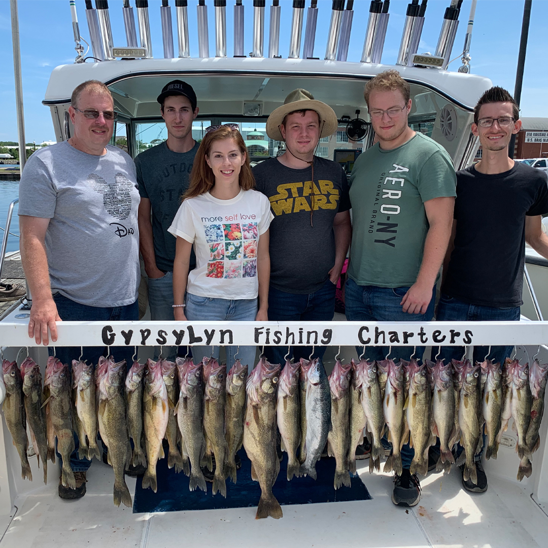 family with walleye catch