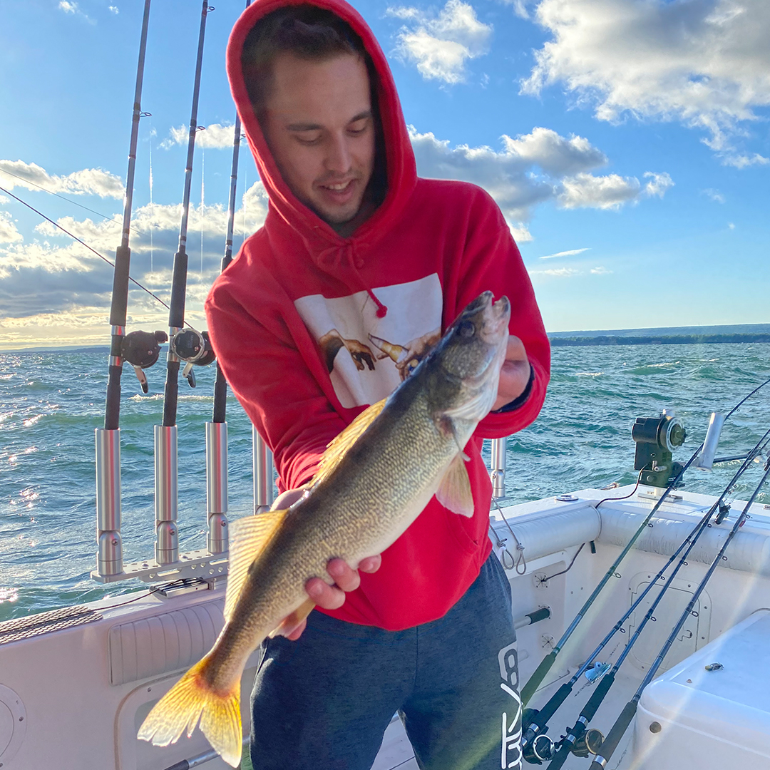family with walleye catch