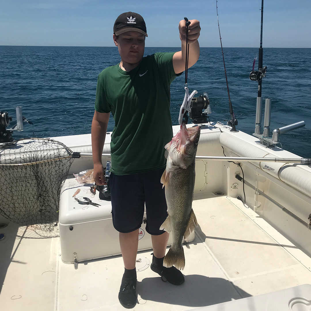 boy with a big walleye